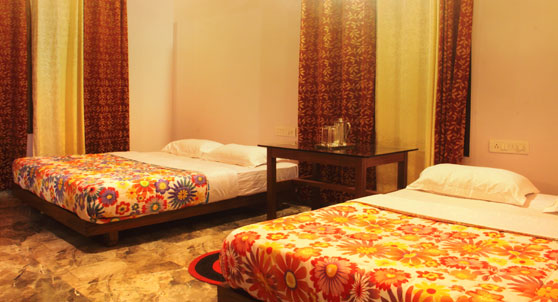 King sizeed 2 beds inside the premium cottage suite.